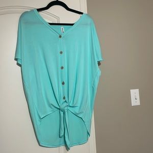 Light turquoise buttoned top